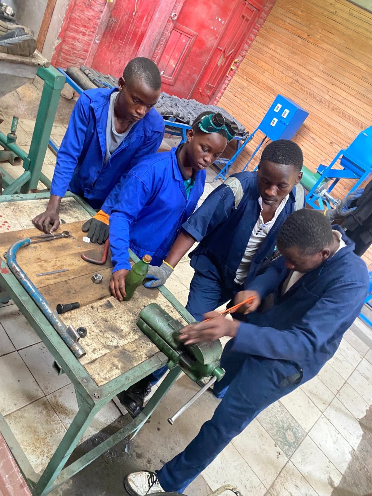 A-Z Academy students doing fitting work